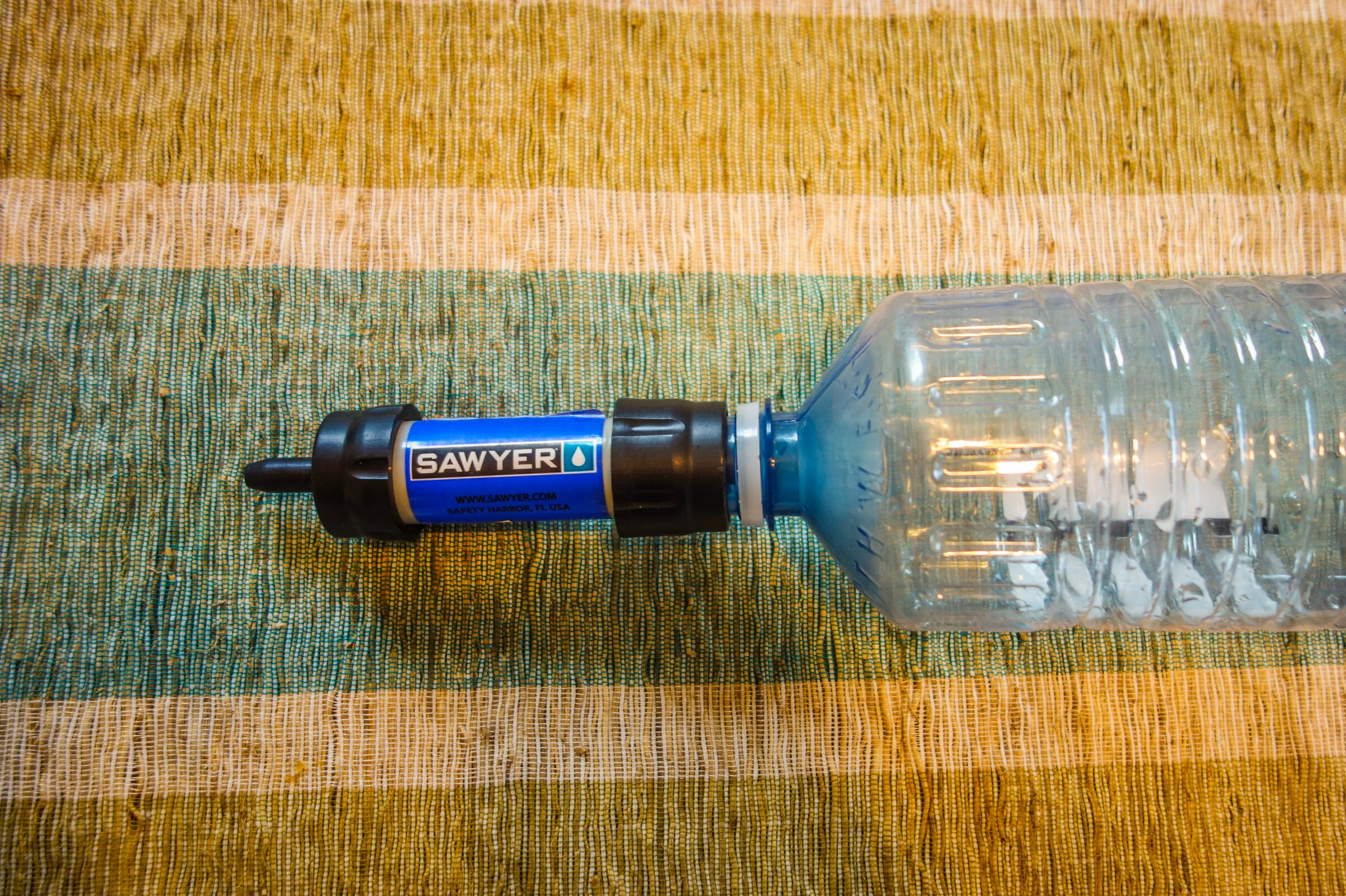 sawyer mini attached to a disposable water bottle