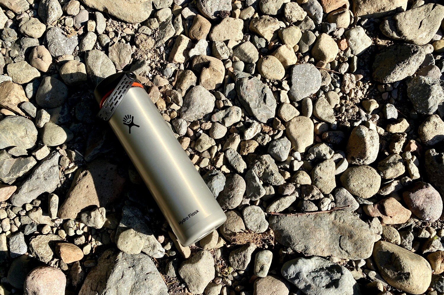 https://www.cleverhiker.com/wp-content/uploads/2020/05/Hiking-with-the-Hydro-Flask-Lightweight-Trail-Series-Wide-Mouth-Vacuum-Insulated-Water-Bottles.jpeg