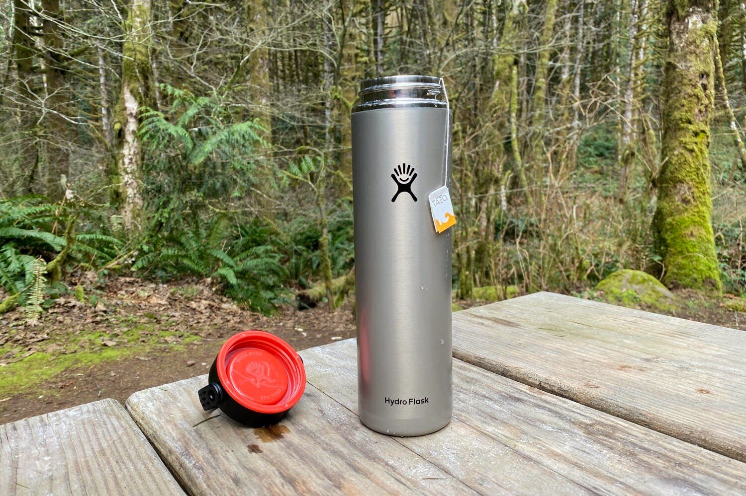 https://www.cleverhiker.com/wp-content/uploads/2020/05/Making-hot-tea-in-the-Hydro-Flask-Lightweight-Trail-Series-Wide-Mouth-Vacuum-Insulated-Water-Bottles-while-camping.jpeg