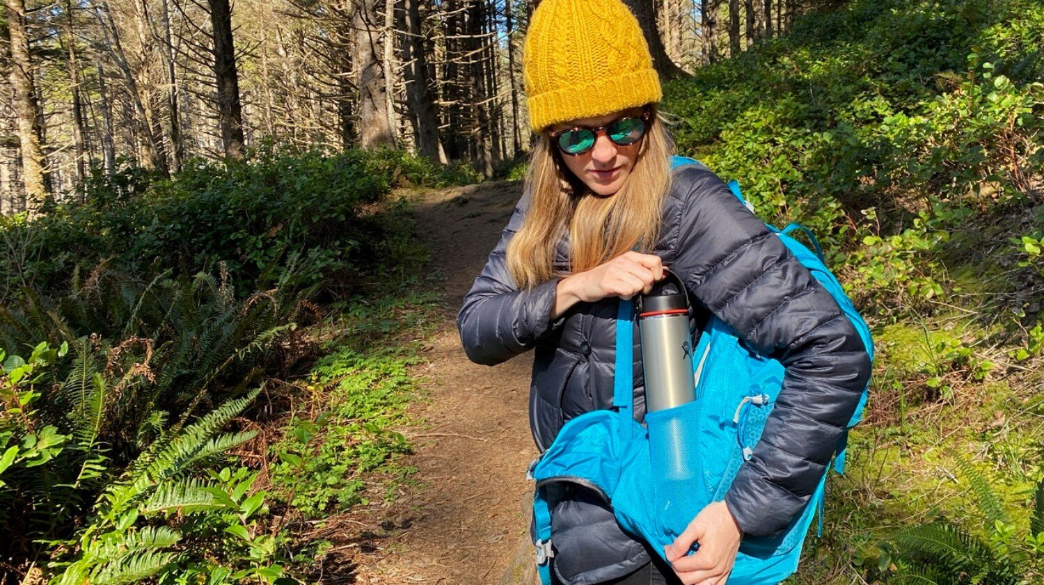 https://www.cleverhiker.com/wp-content/uploads/2020/05/Taking-the-Hydro-Flask-Lightweight-Trail-Series-Wide-Mouth-Vacuum-Insulated-Water-Bottles-on-a-day-in-the-Gregory-Juno-H2O-24-Liter-Hydration-Daypack.jpeg