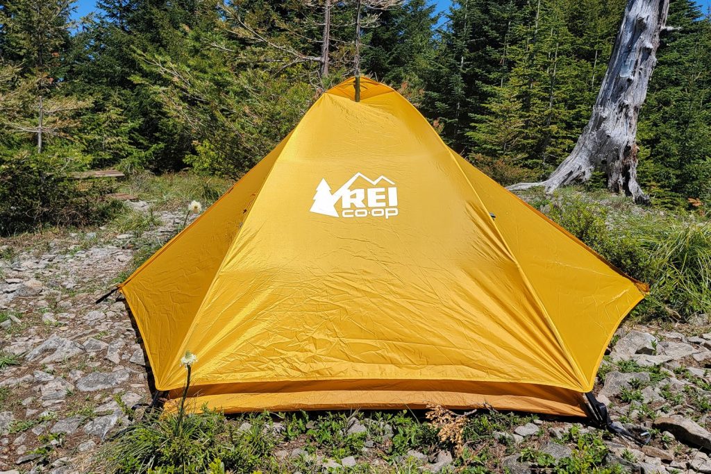 A closeup picture of a tent with the fly on.