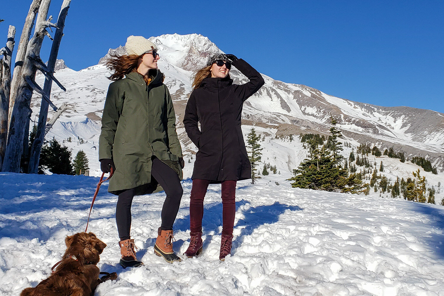 https://www.cleverhiker.com/wp-content/uploads/2023/08/A-women-wearing-the-Sorel-Slimpack-II-Lace-Boots-in-front-of-a-snow-covered-mountain.jpeg