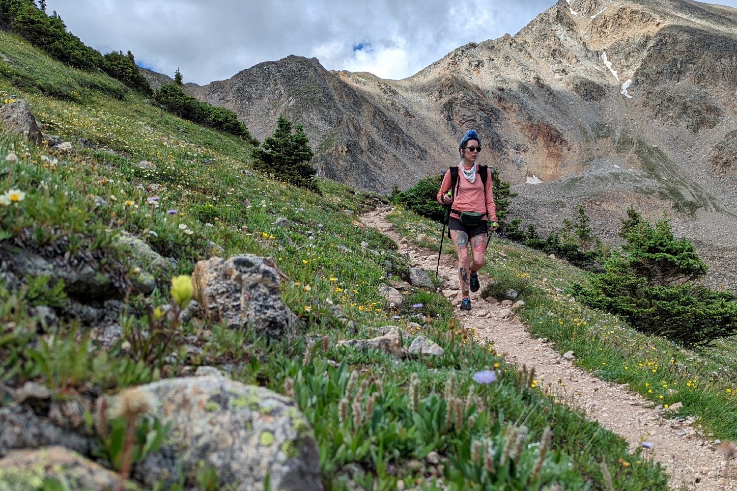 backpacker walking down the colorado trail