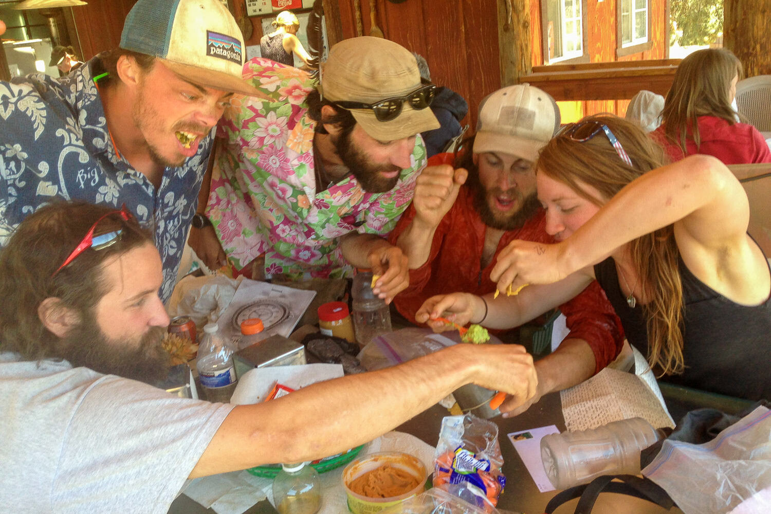 Thru-hikers eating together.