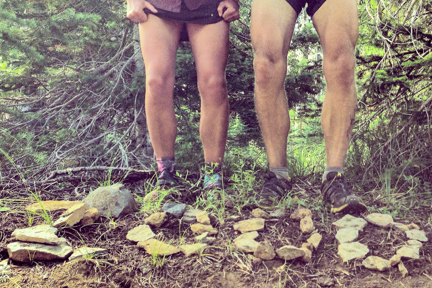 Strong hikers use rocks to make the number 2000 to celebrate hiking 2000 miles.