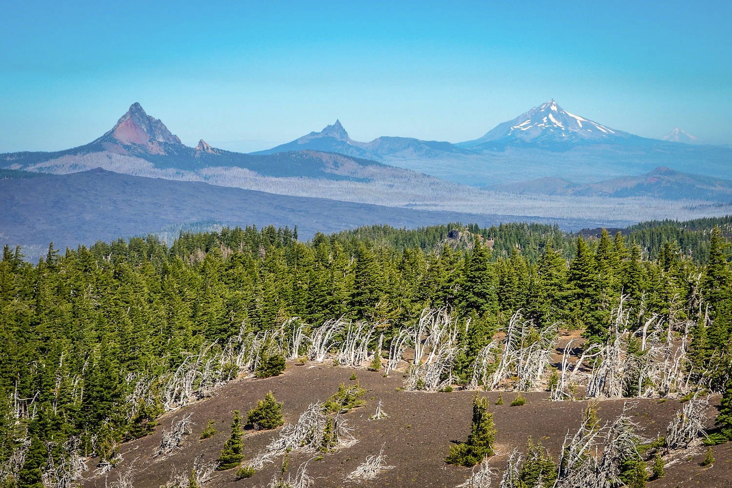 volcanoes in a line in the central oregon cascades.