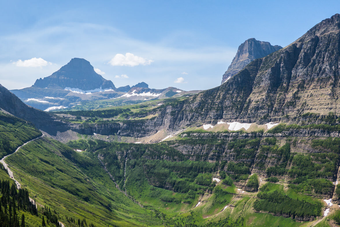 a view of a the high mountain pass road called going-to-the-sun road in glacier national park