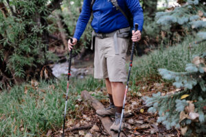 A man hiking in a pair of shorts