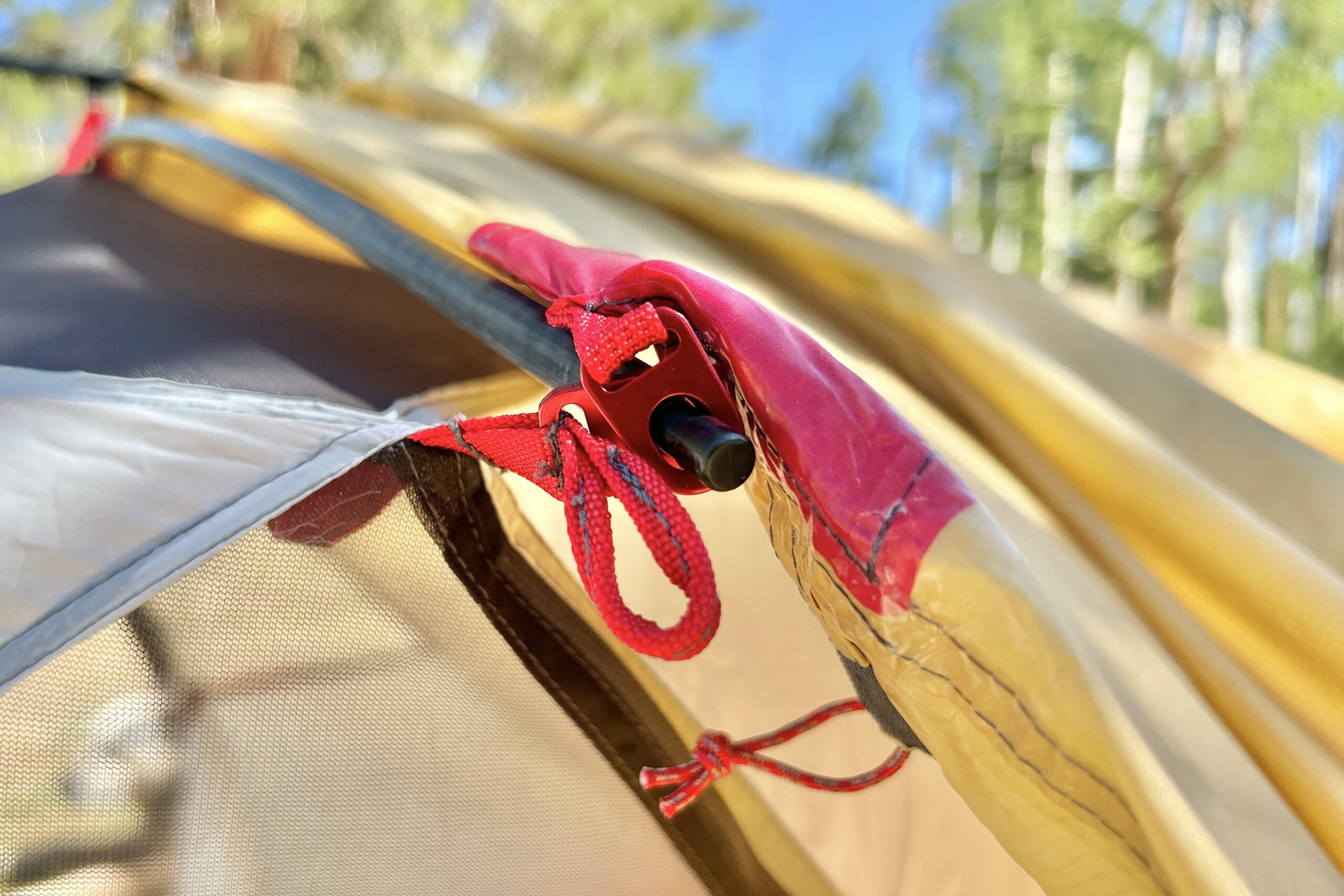 A closeup of the brow pole of a tent.