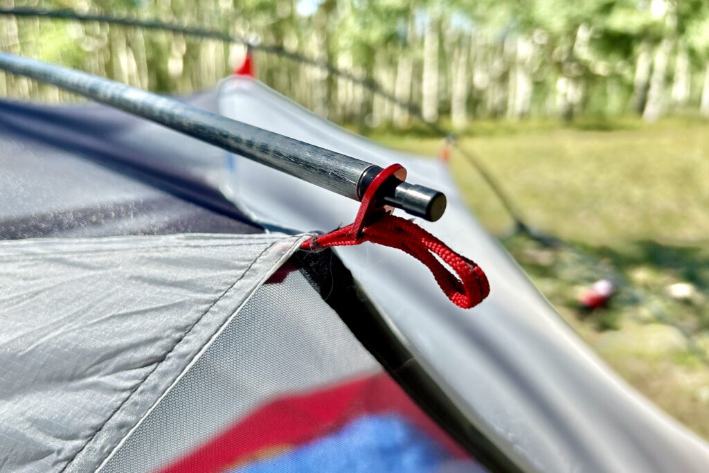 A closeup of the brow pole of a tent with the fly off.