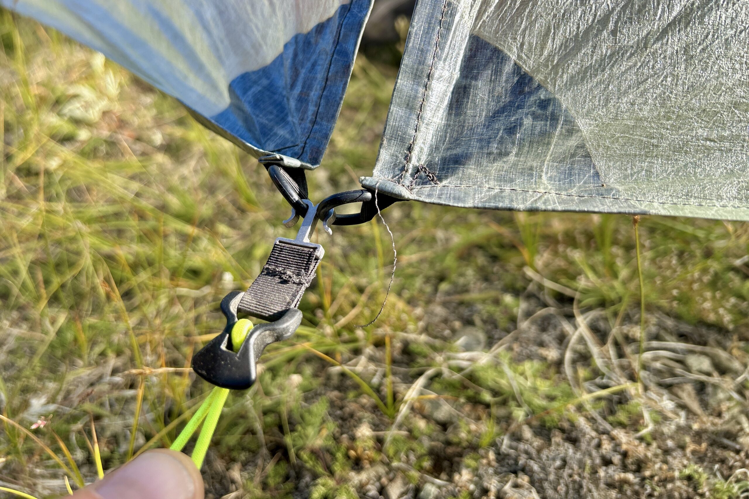 a close up of the guylines, hooks and loops on the rainfly/vestibule/door part of the zpacks duplex classic tent