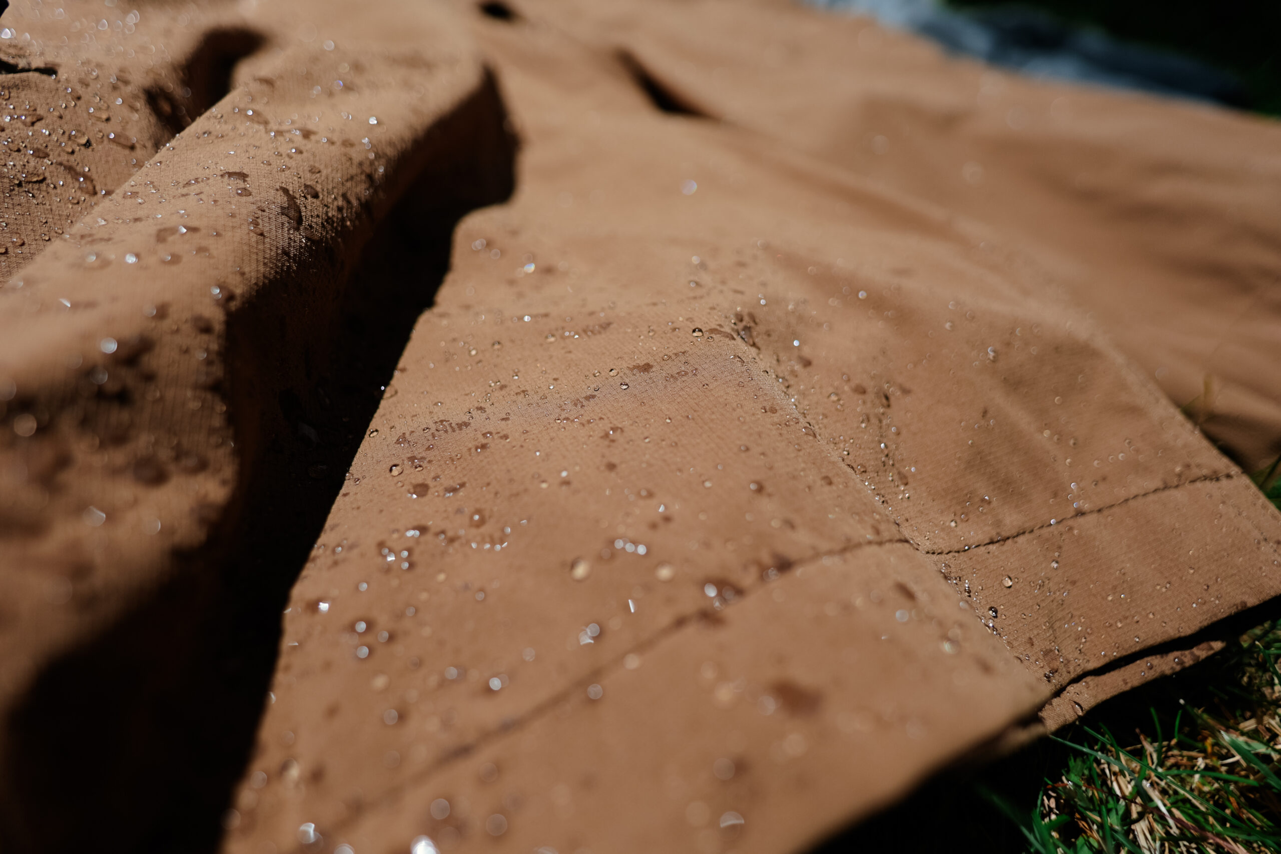 Close up of wet hiking shorts drying in the sun.