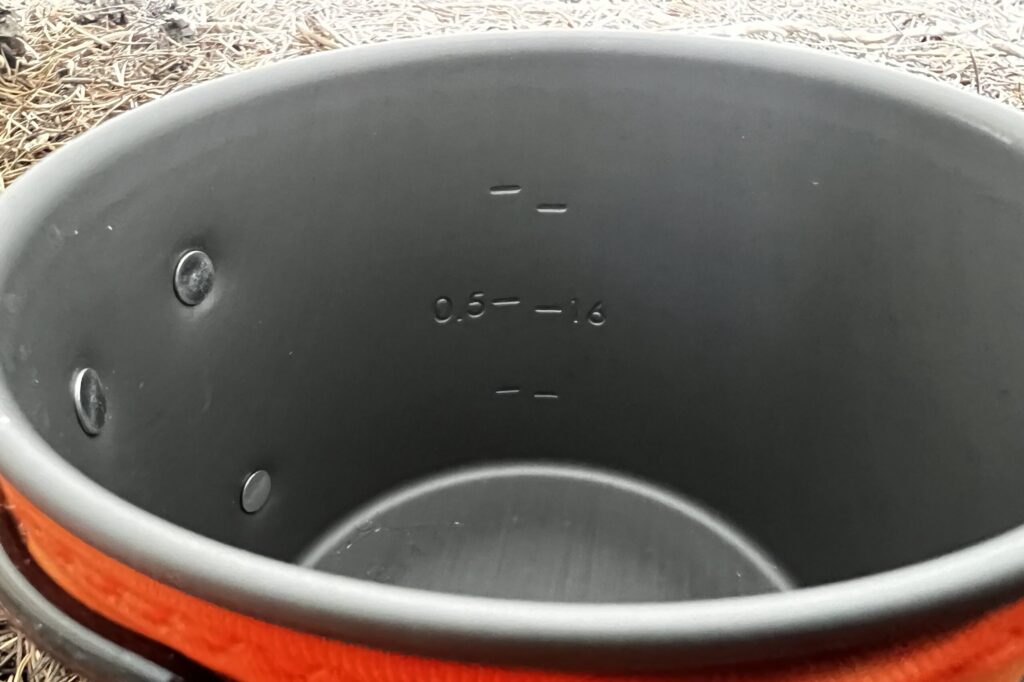 A closeup showing the measurement markings on the inside of the MiniMo pot.