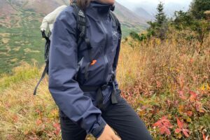 A closeup of the zippers of a rain jacket.