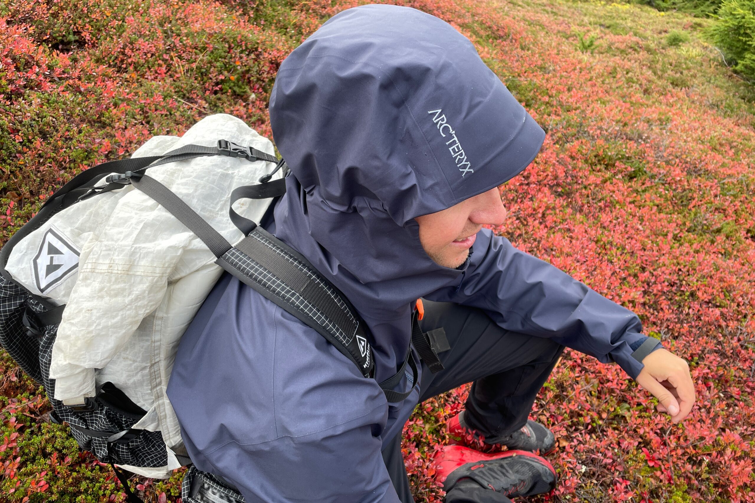 A detailed shot of the brim of a hooded rain jacket.