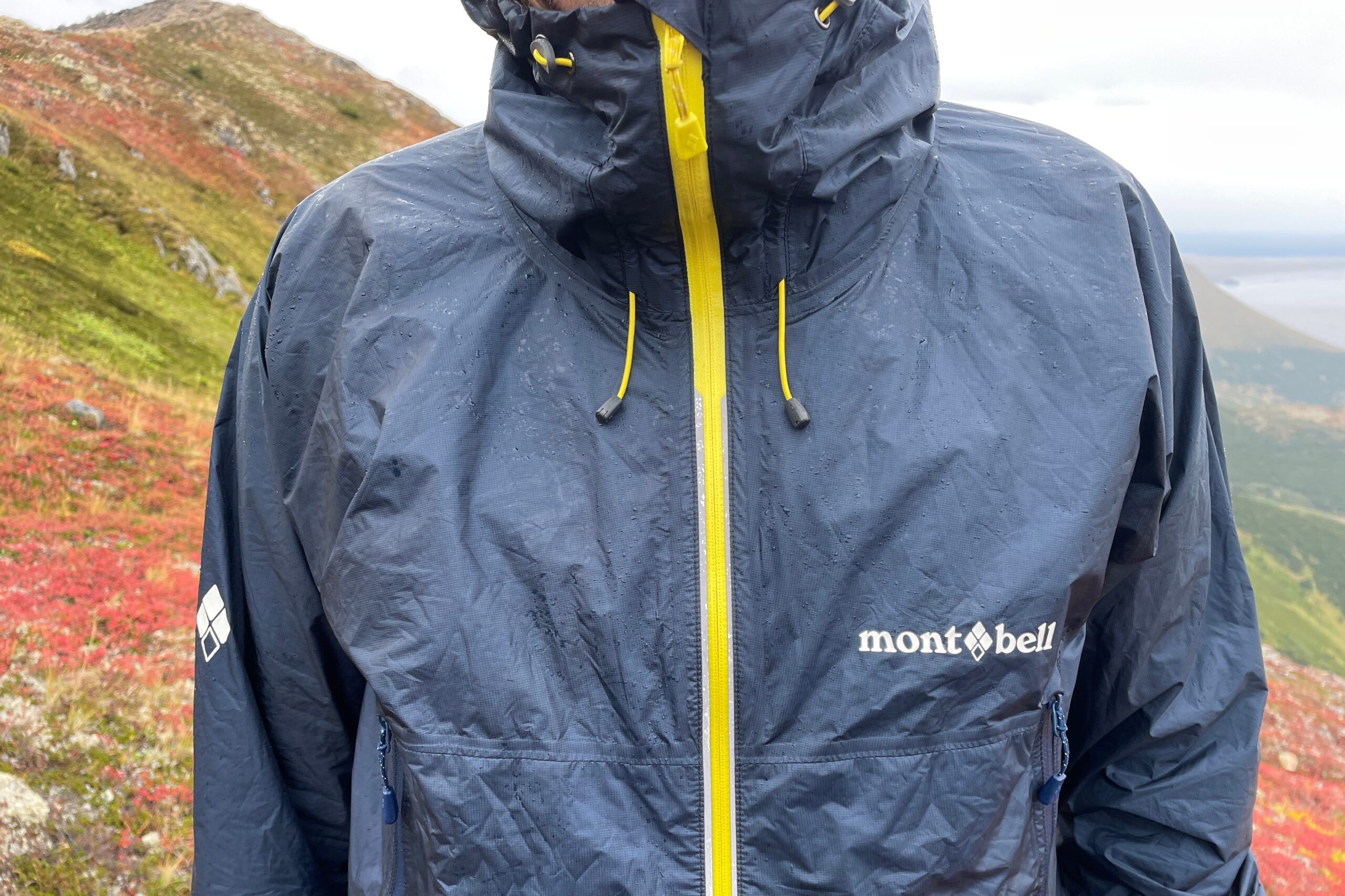 A closeup of the upper half of a rain jacket.