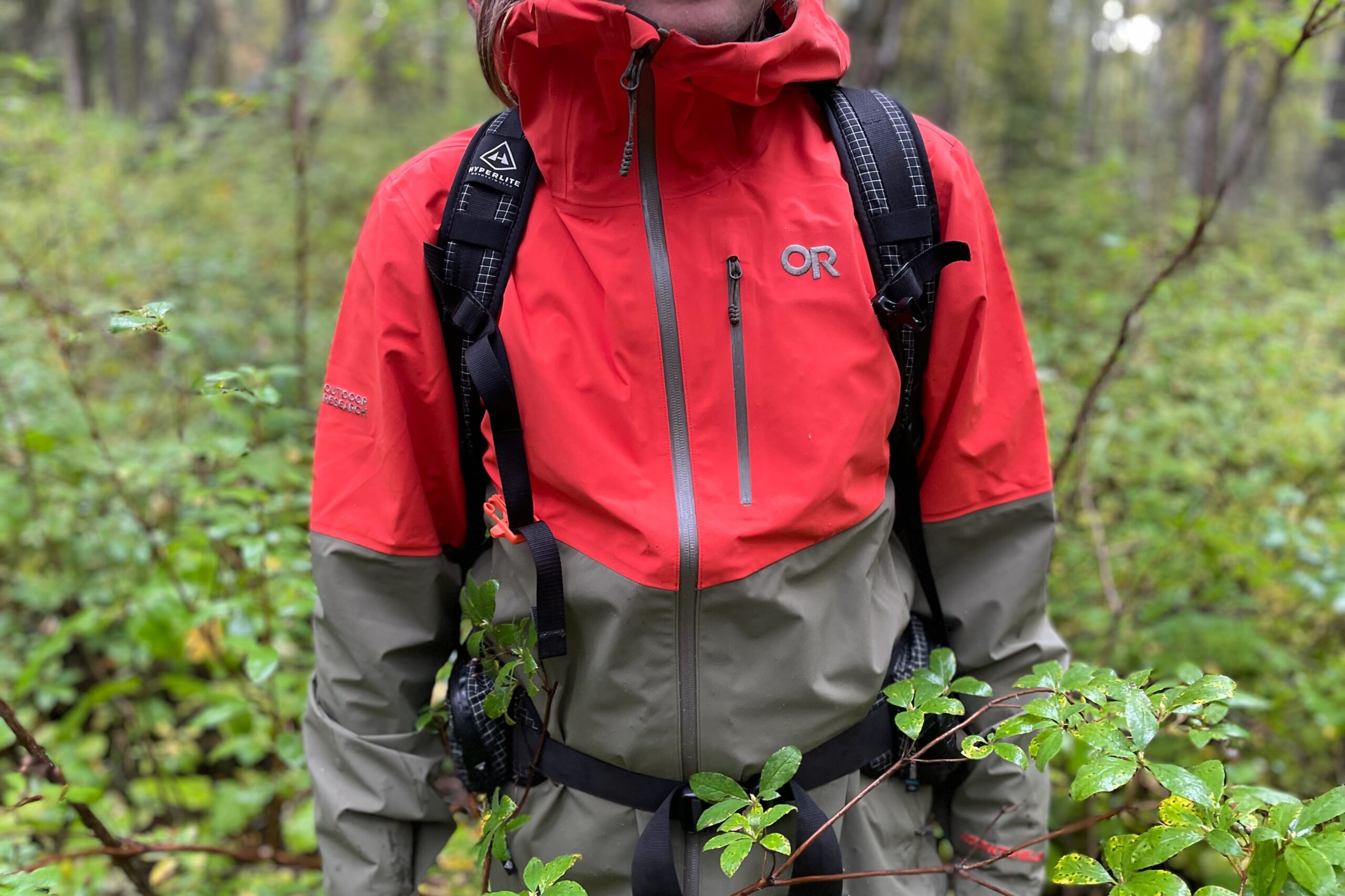 A closeup of the zippers of a rain jacket.