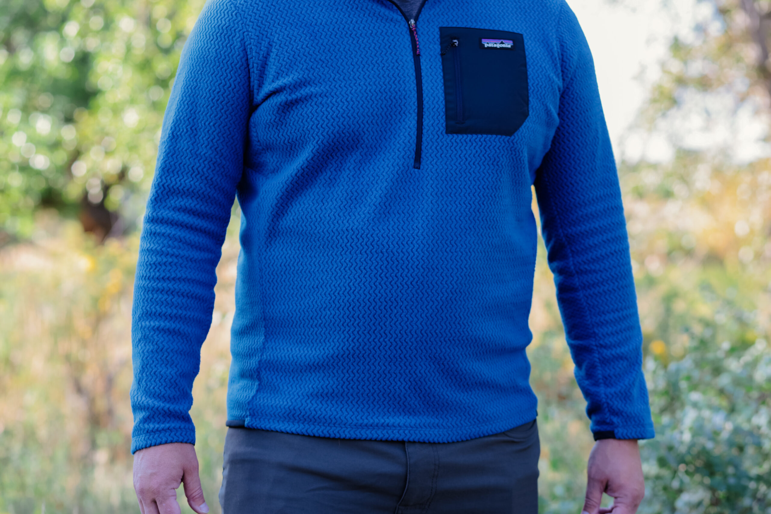 A man wearing a blue fleece.