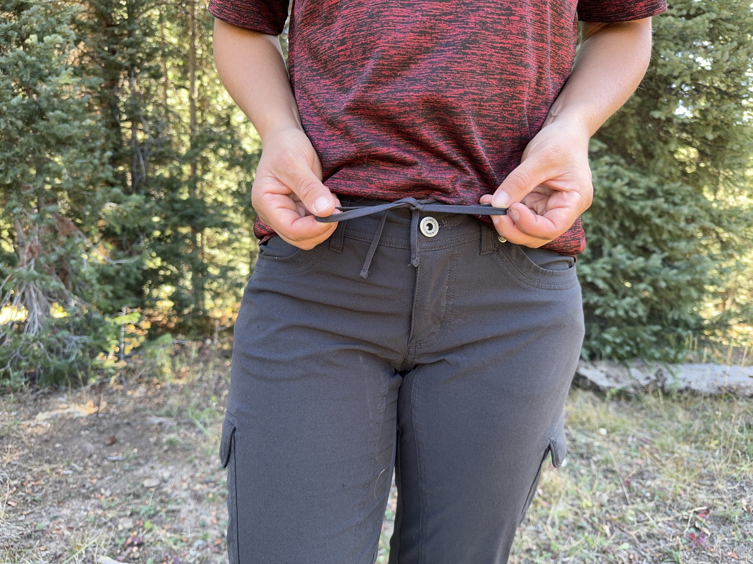 the drawstring and button waist closure of the kuhl freeflex pants