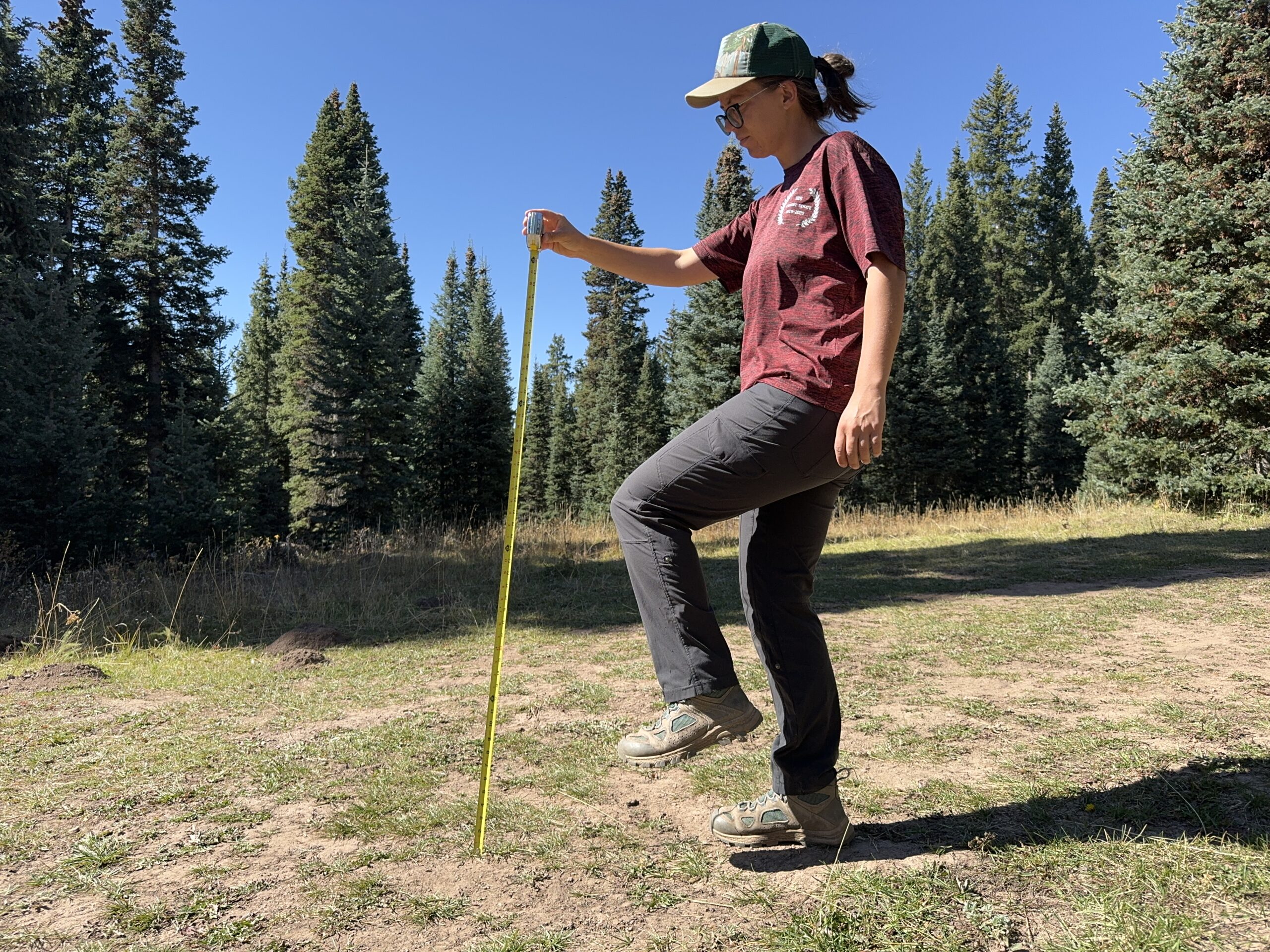 a cleverhiker gear analyst measuring mobility and restriction limits on the kuhl freeflex pants