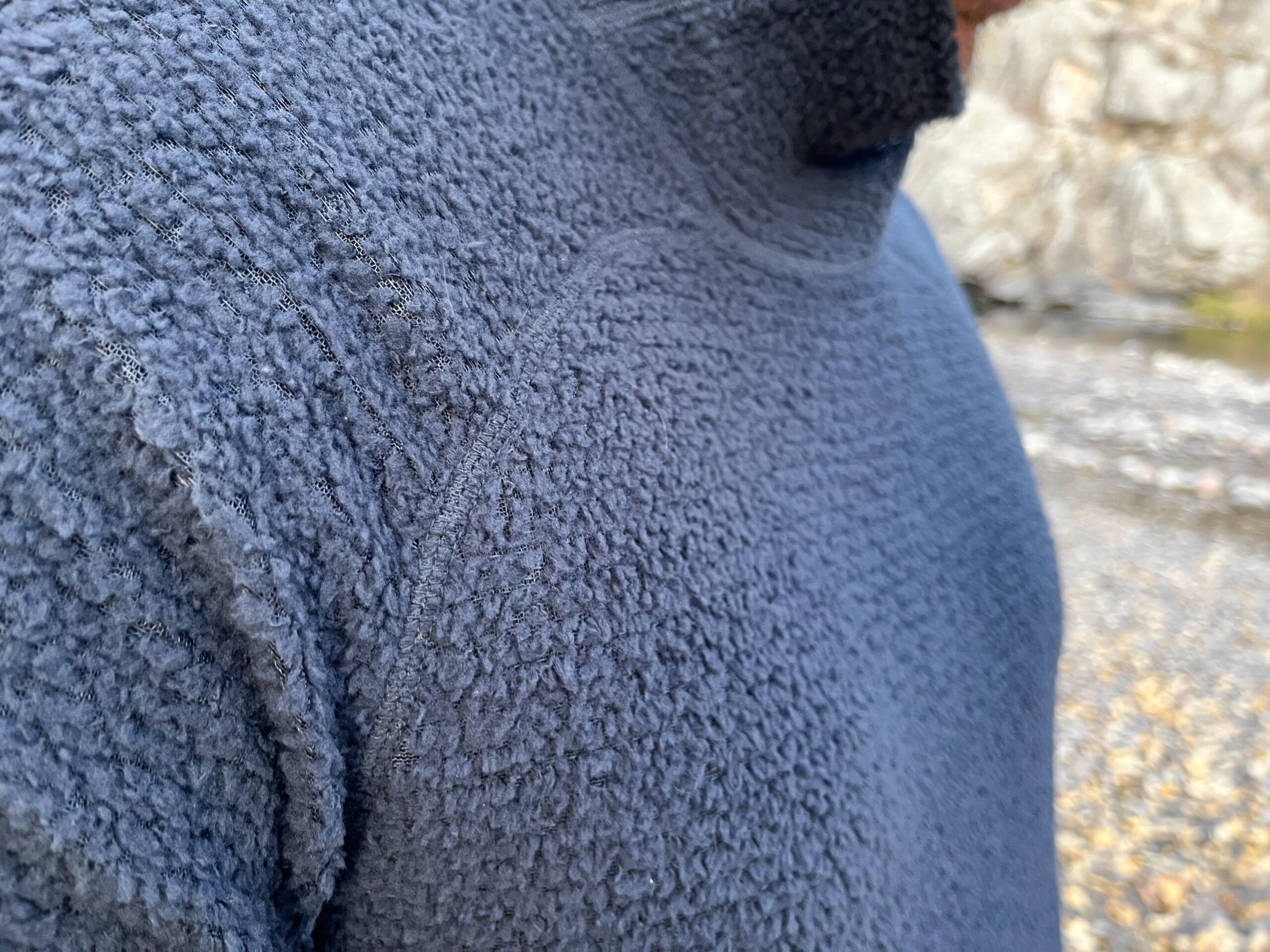 a close up of the breathable fleece material of the eddie bauer super sevens fleece