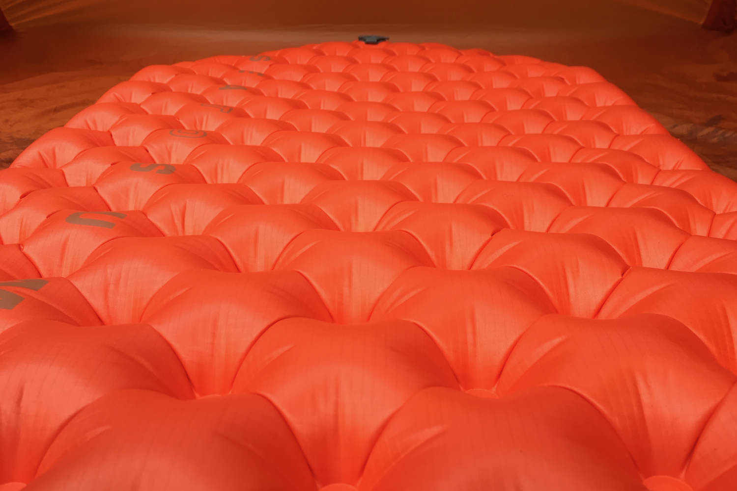 a closeup view of the inflated sea to summit ultralight insulated sleeping pad