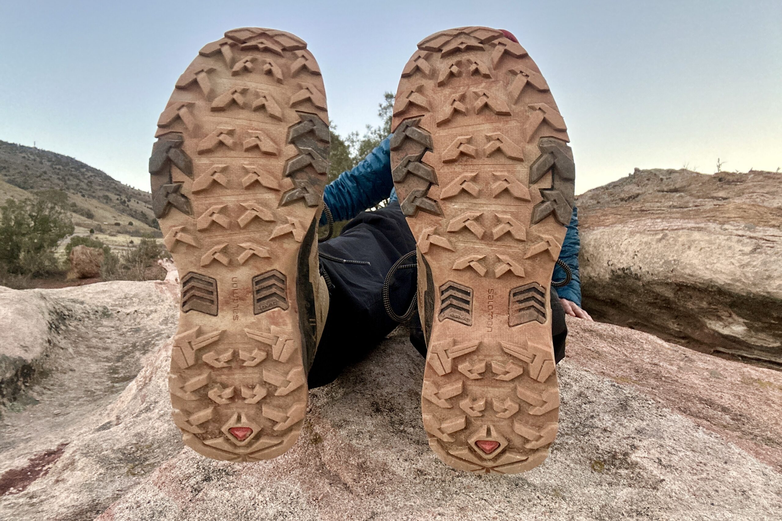 Close up of the tread / traction on the bottom of some hiking boots.