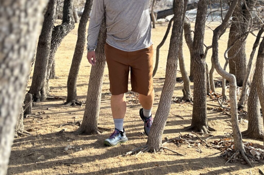 Man walking in woods.