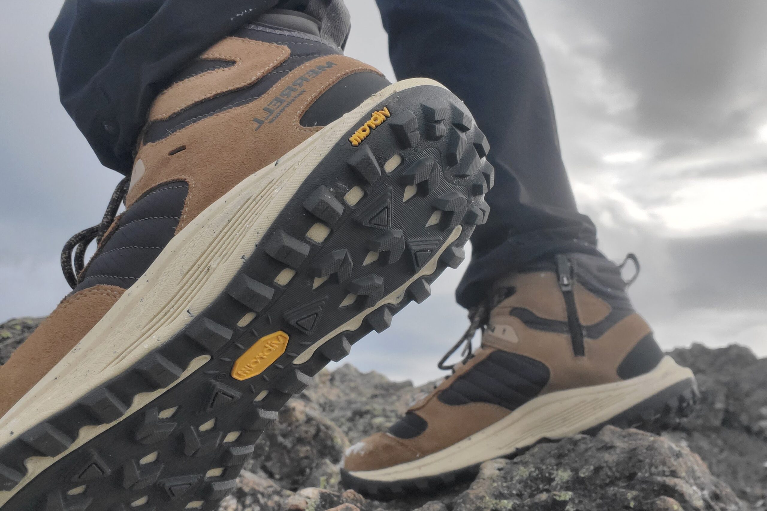 A closeup of the traction on a pair of boots.