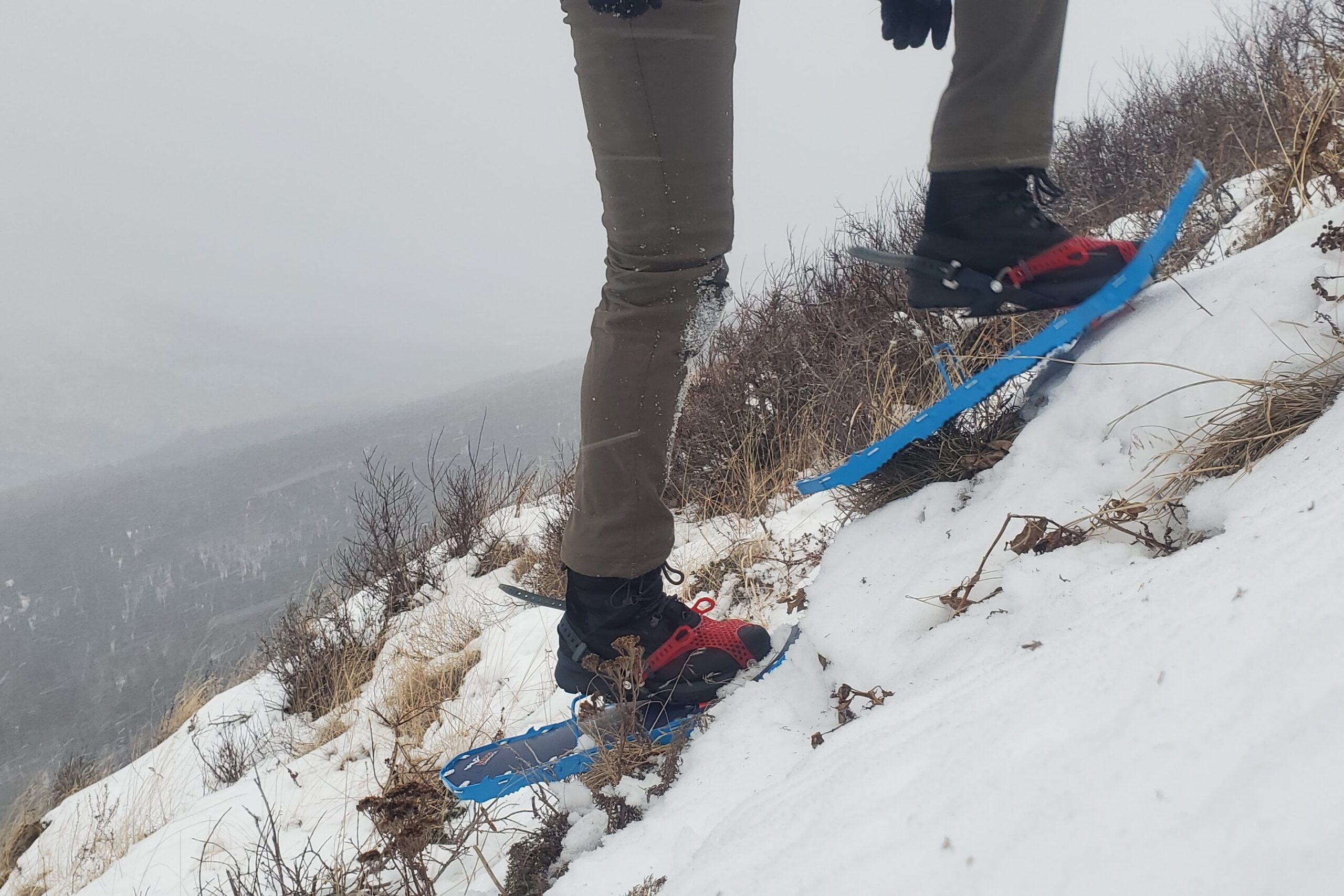 Snowshoes walking uphill