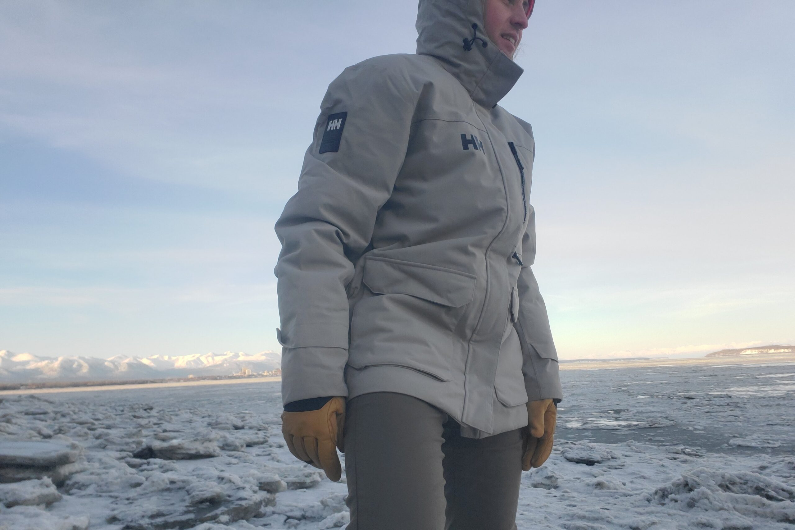 A closeup of a jacket along a wintery coastline