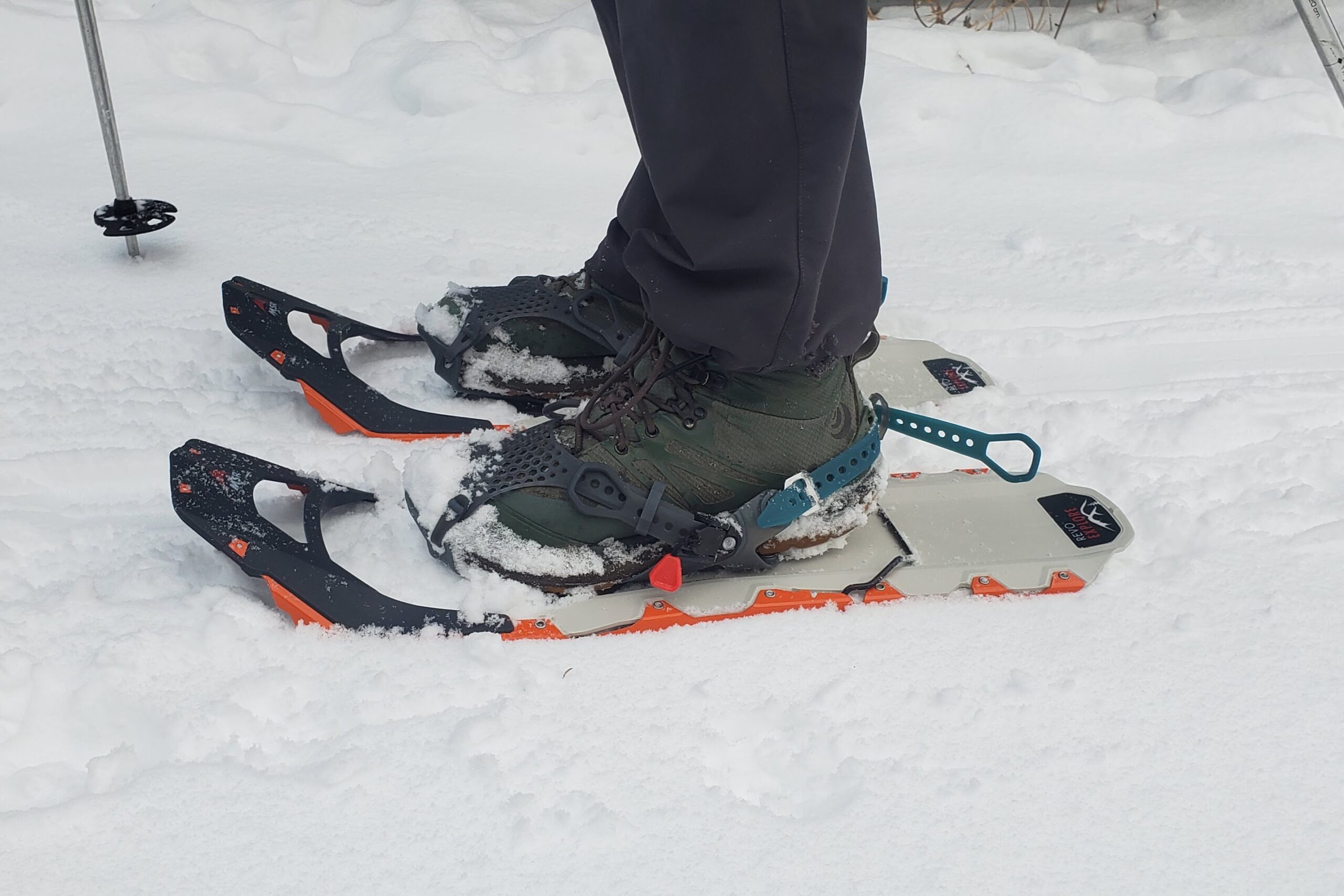 A closeup of the bindings of a snowshoe