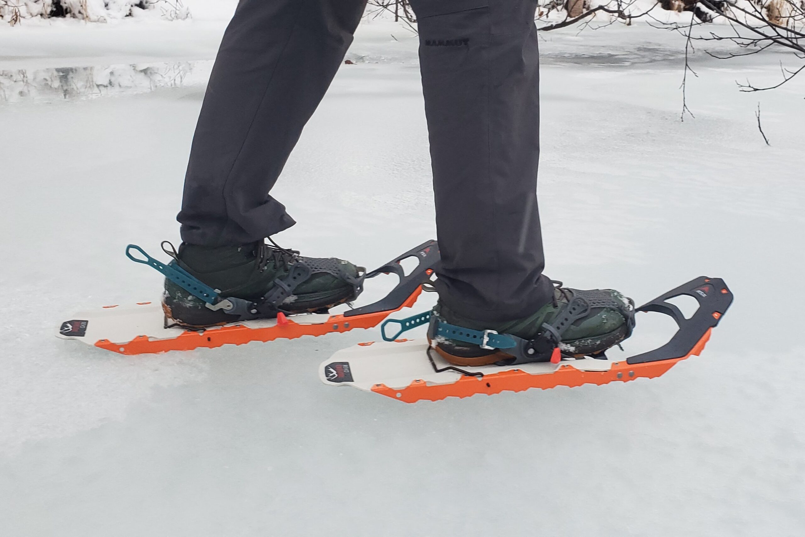 A closeup of the bindings on snowshoes