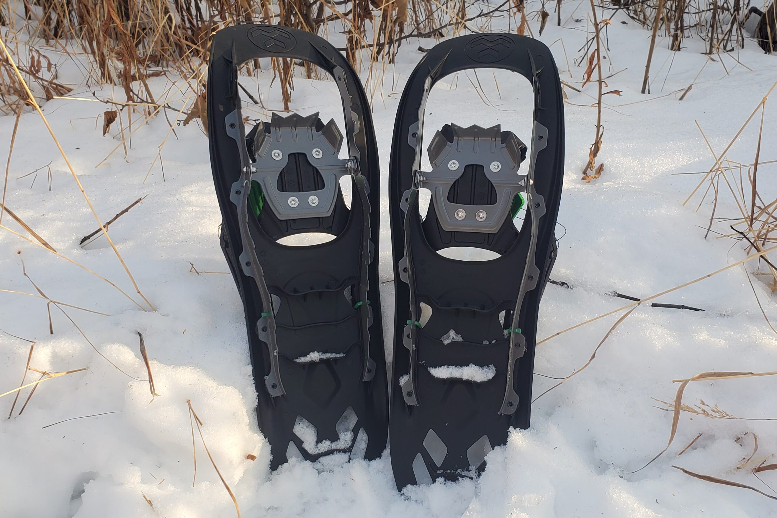 The underside of a pair of snowshoes.