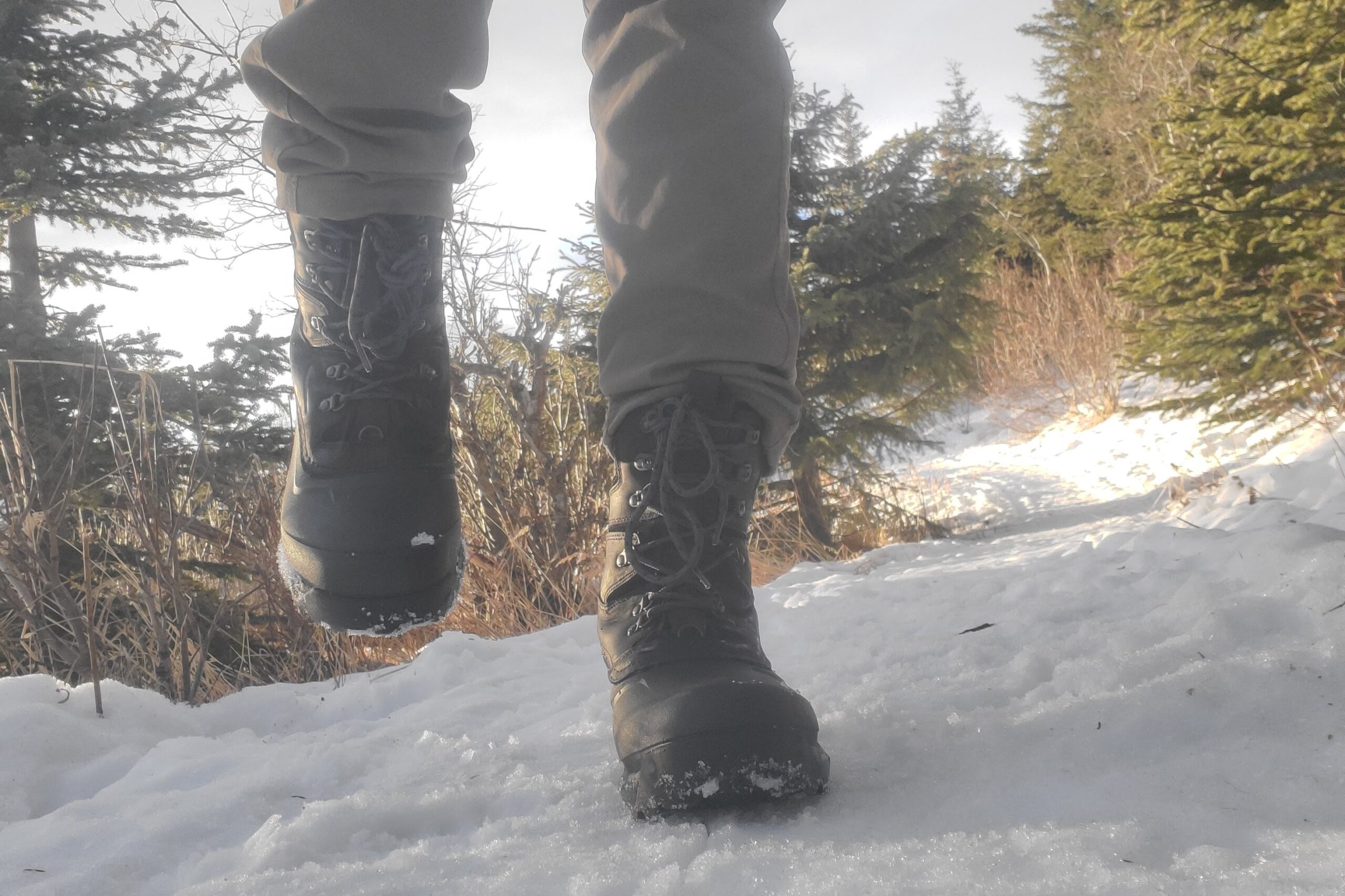 A closeup of the laces on a pair of winter boots.