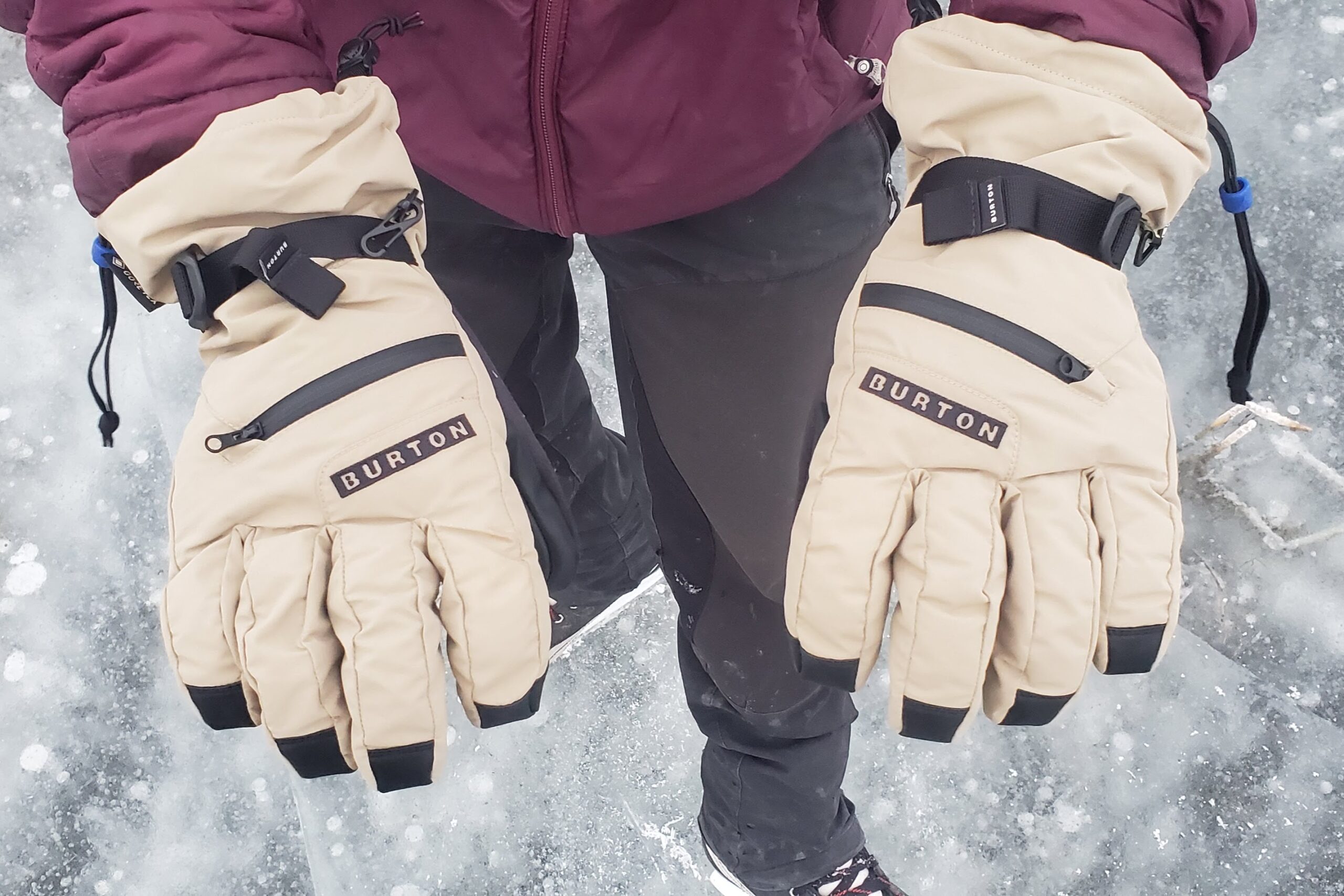 A closeup of the back of the hands of a pair of gloves.