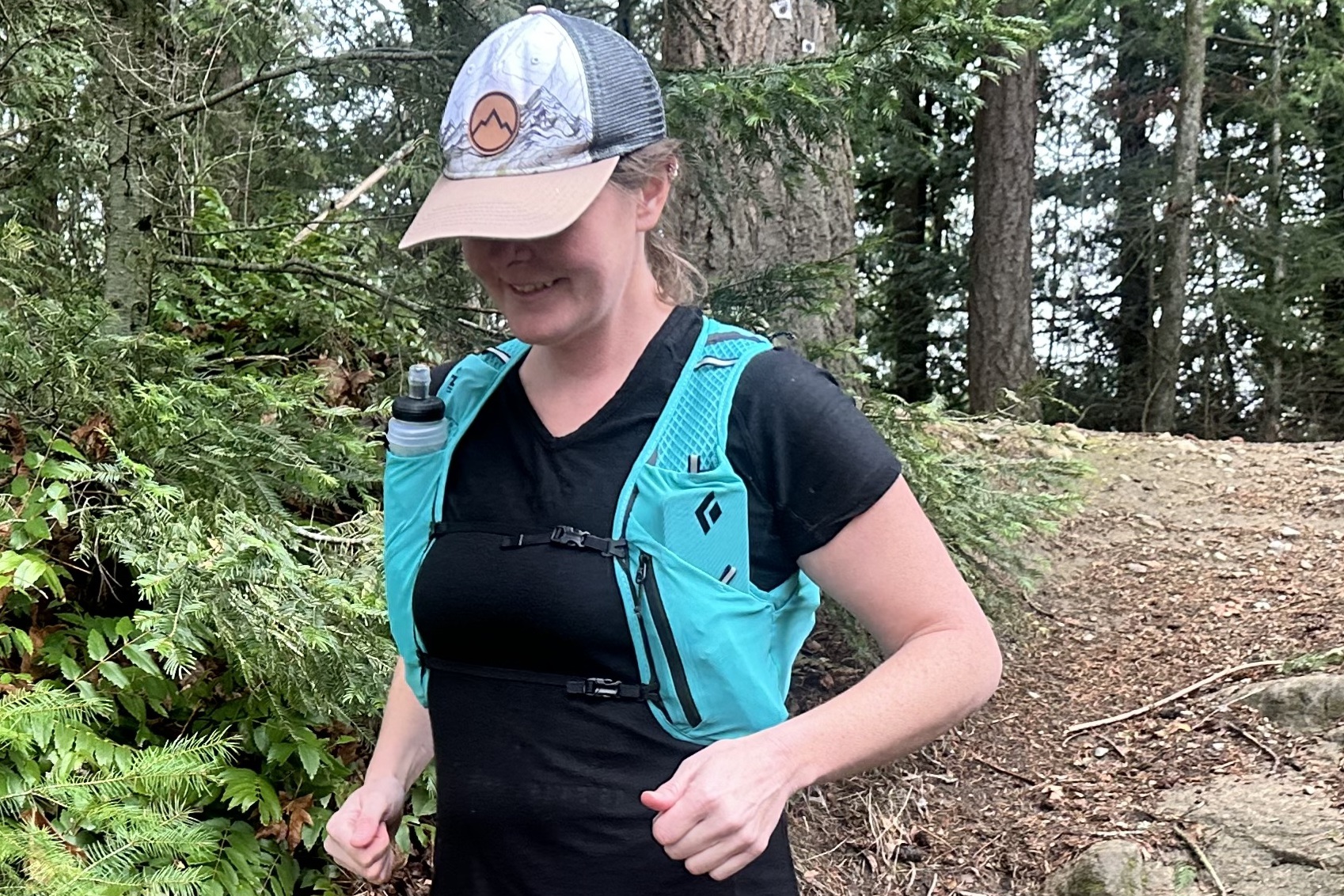 Runner wearing a Black Diamond Women's Distance 4 Hydration Vest