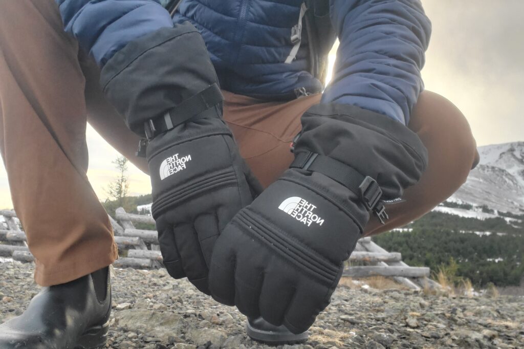 A closeup of the back of the hands of winter gloves.