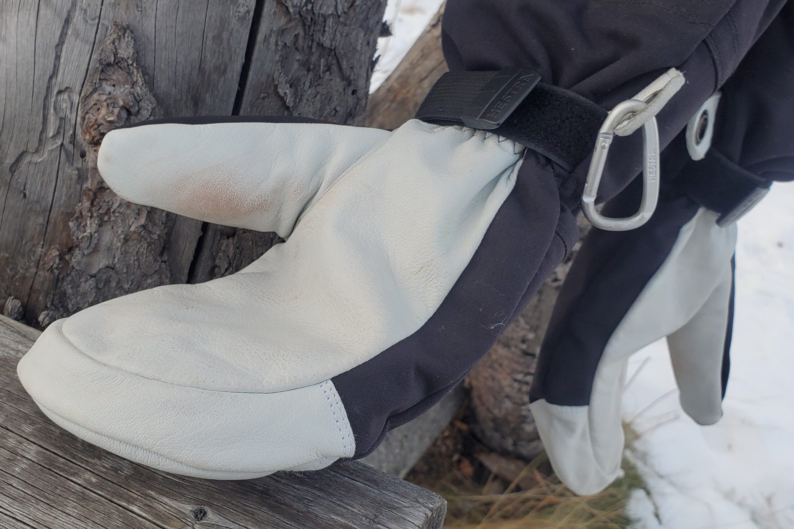 A closeup of the leather palm of a pair of mittens.