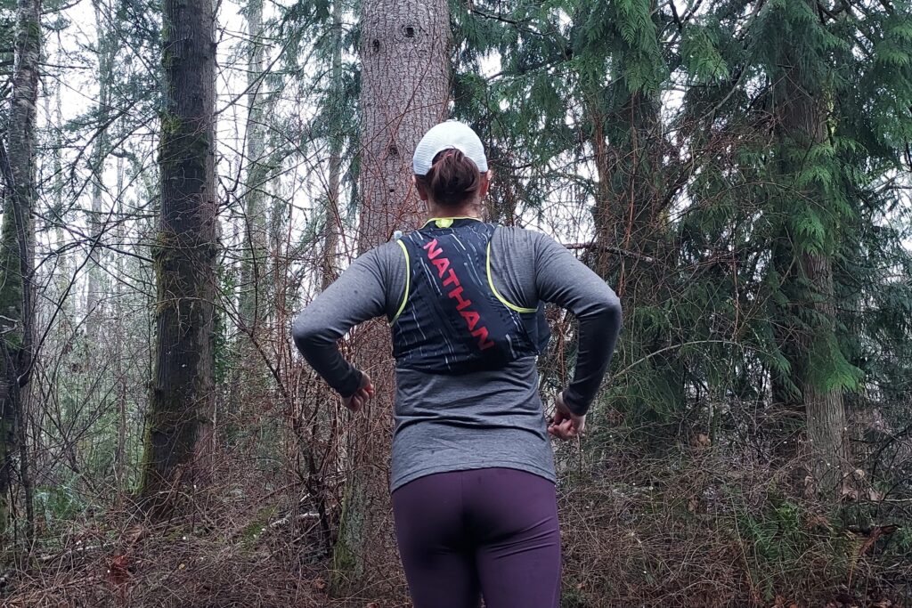 Runner wearing the Nathan Pinnacle 4 Hydration Race Vest