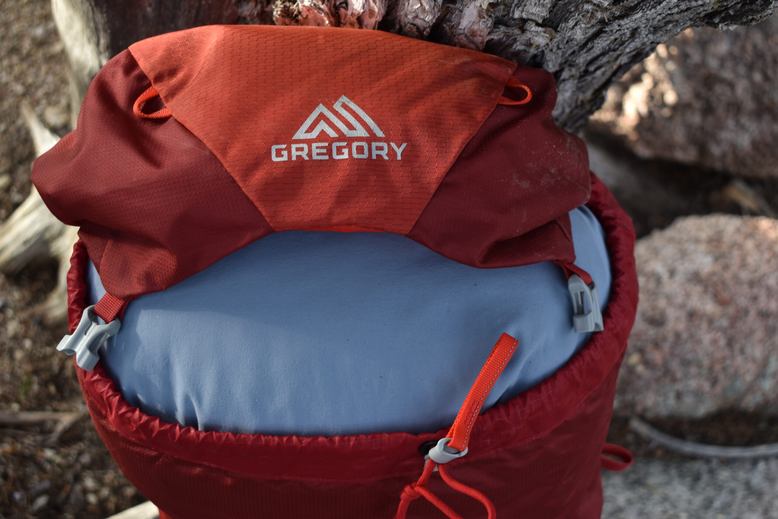 The HEST Camp Pillow fills the entire top opening of a Gregory backpack