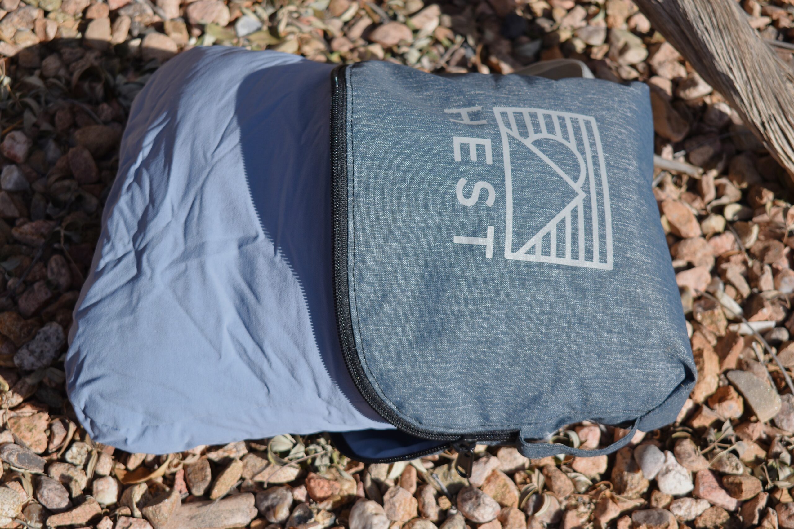 HEST Camp Pillow partially unpacked from its integrated stuff sack