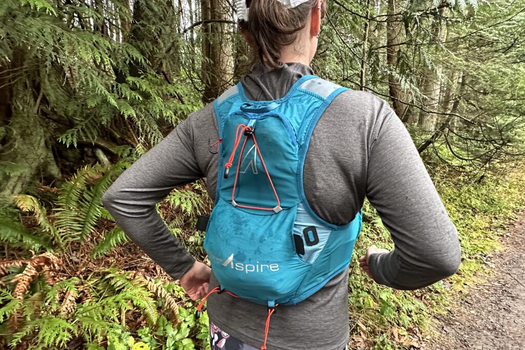 Runner wearing an UltrAspire Alpha 5.0 Race Vest