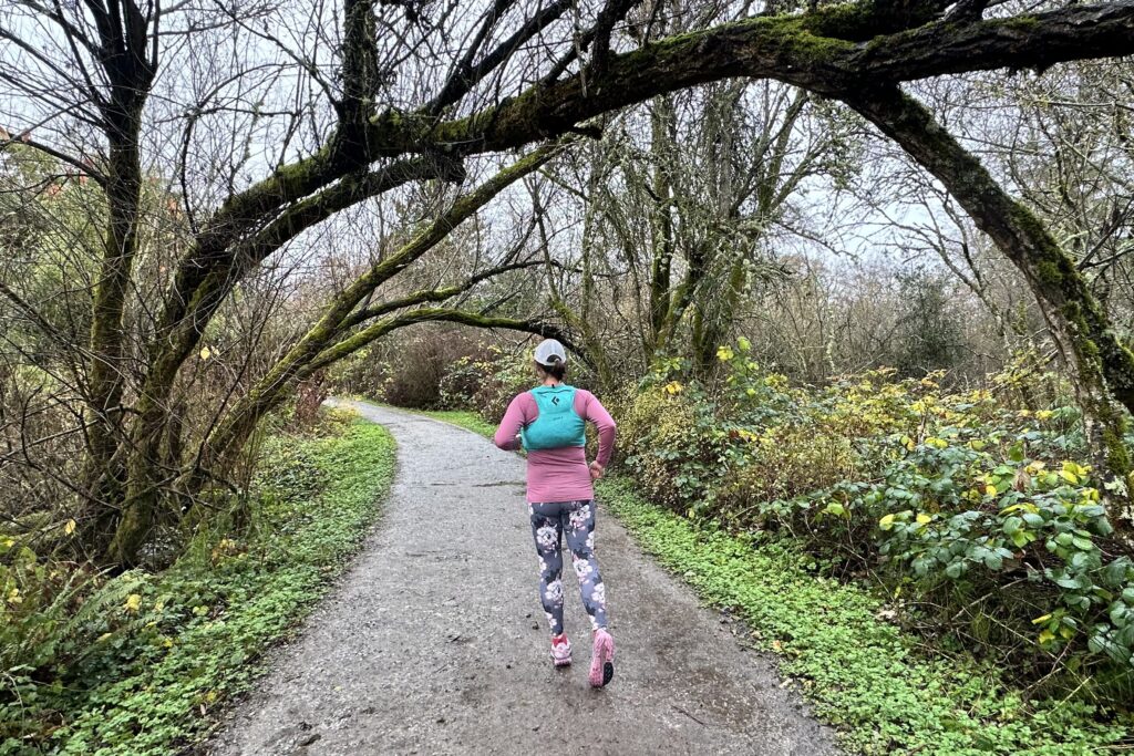 Runner wearing a Black Diamond Women's Distance 4 Hydration Vest