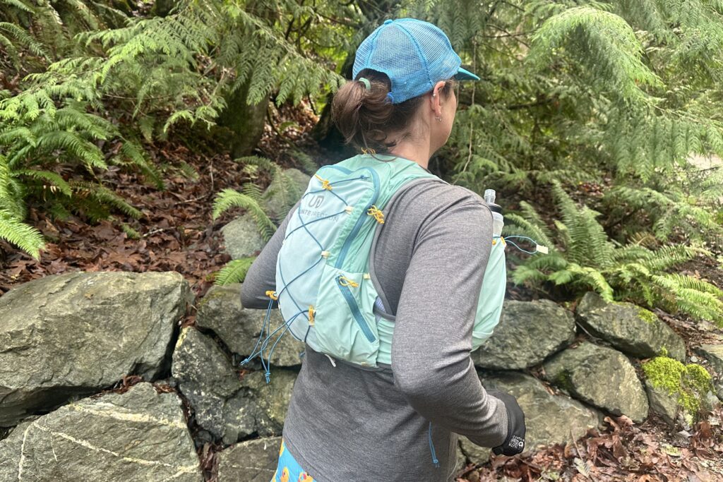 Runner wearing the Ultimate Direction Ultra Vesta 6.0 Hydration Vest