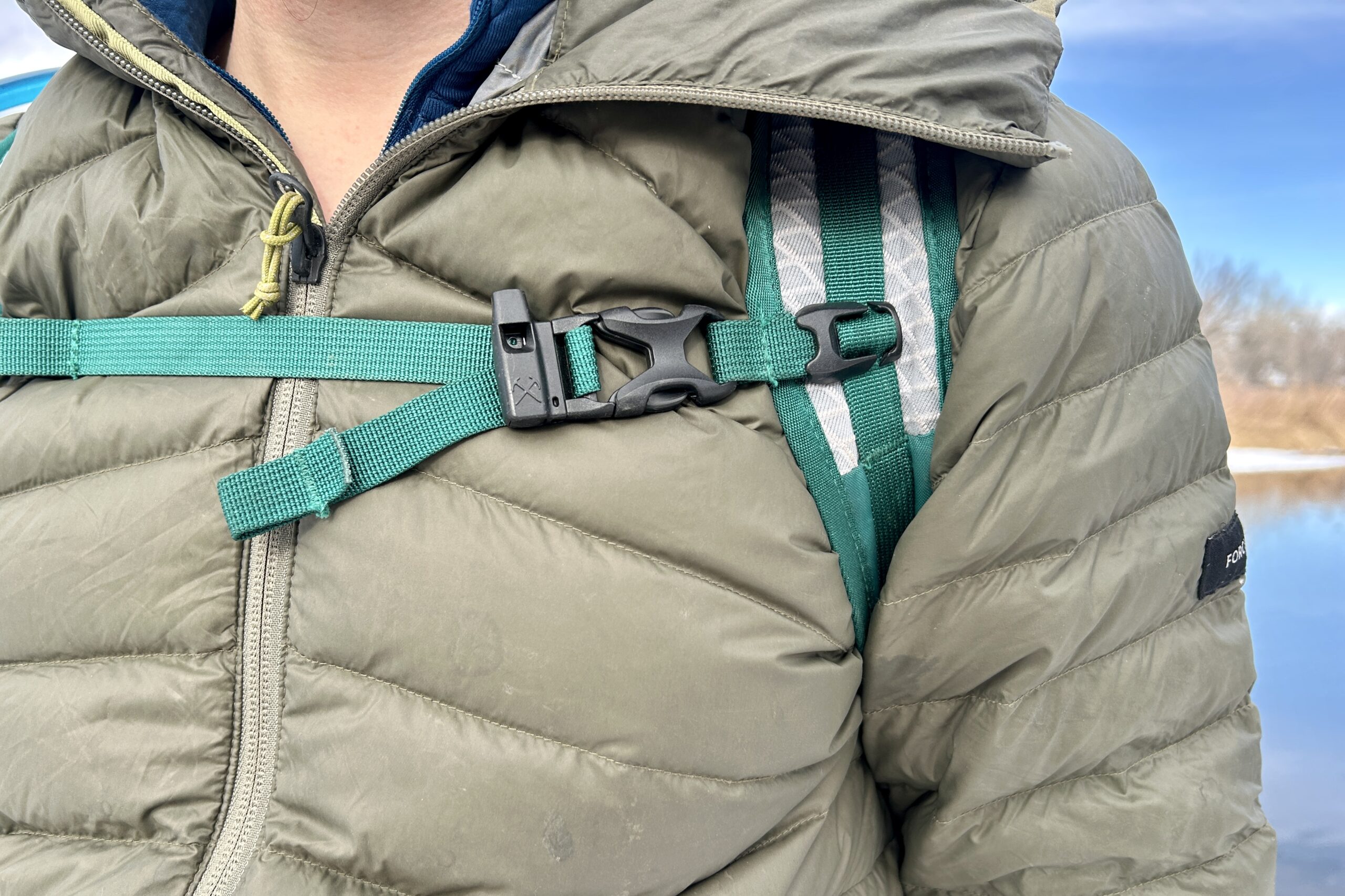 Close up of the shoulder and sternum straps of a daypack.