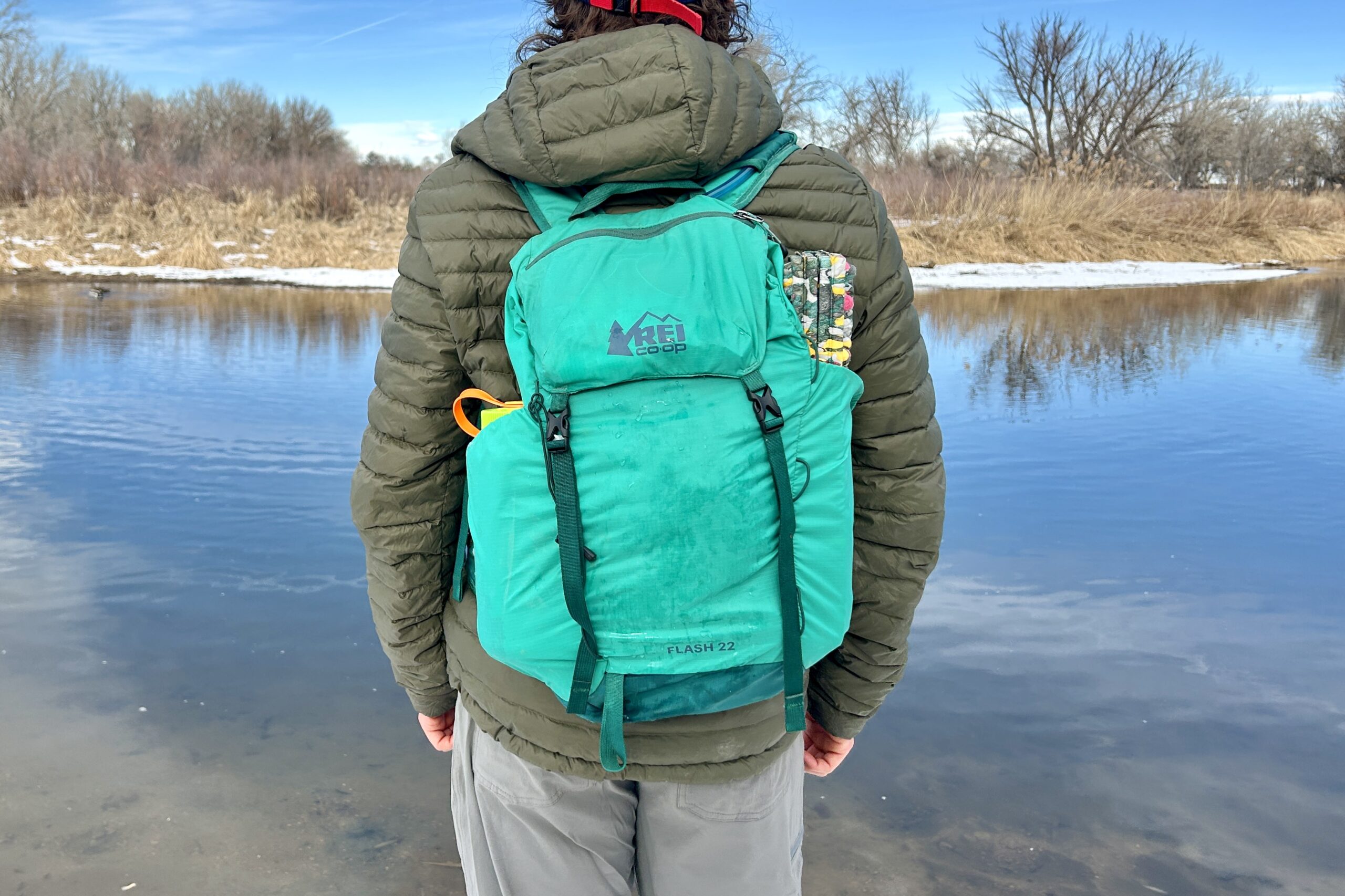 Closeup image of a person wearing a backpack.