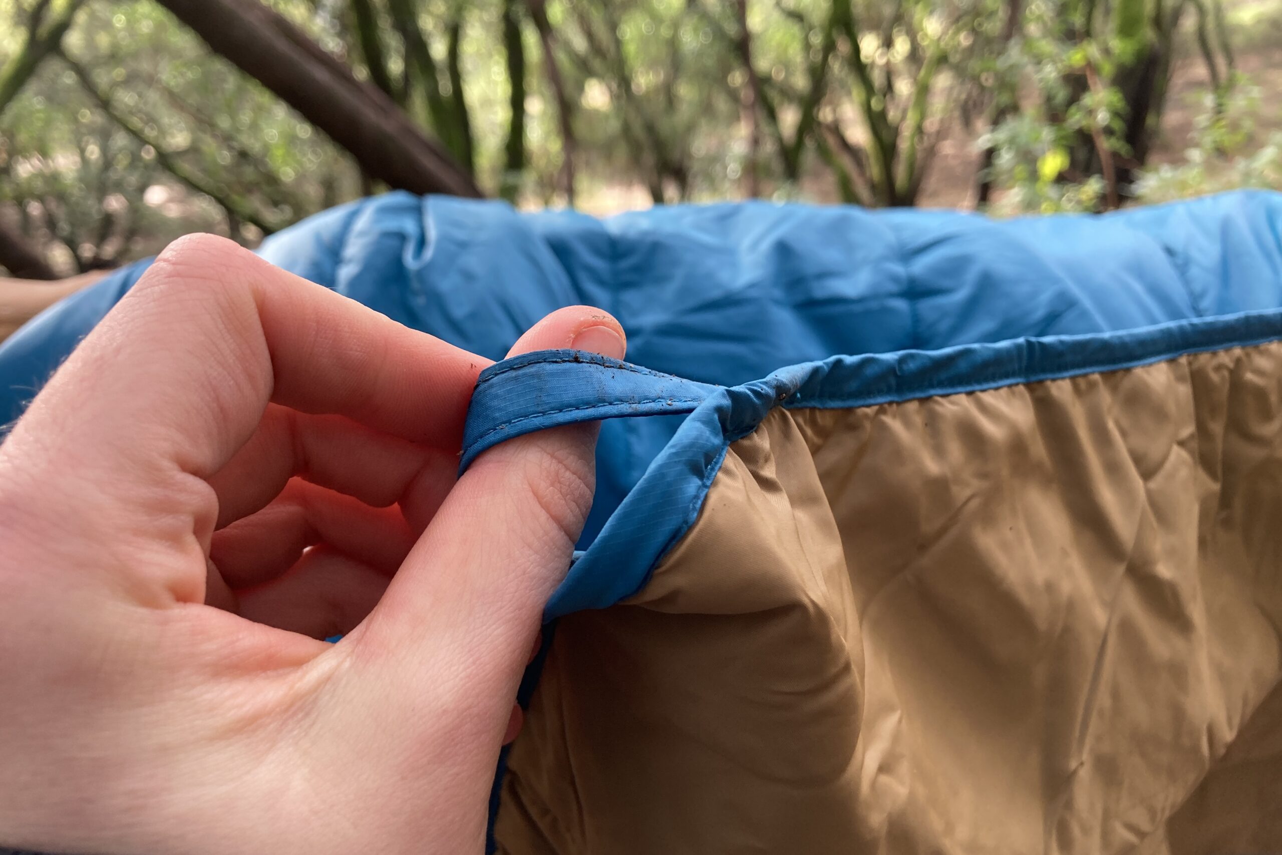 Close up showing the corner loop on the REI Camp Blanket