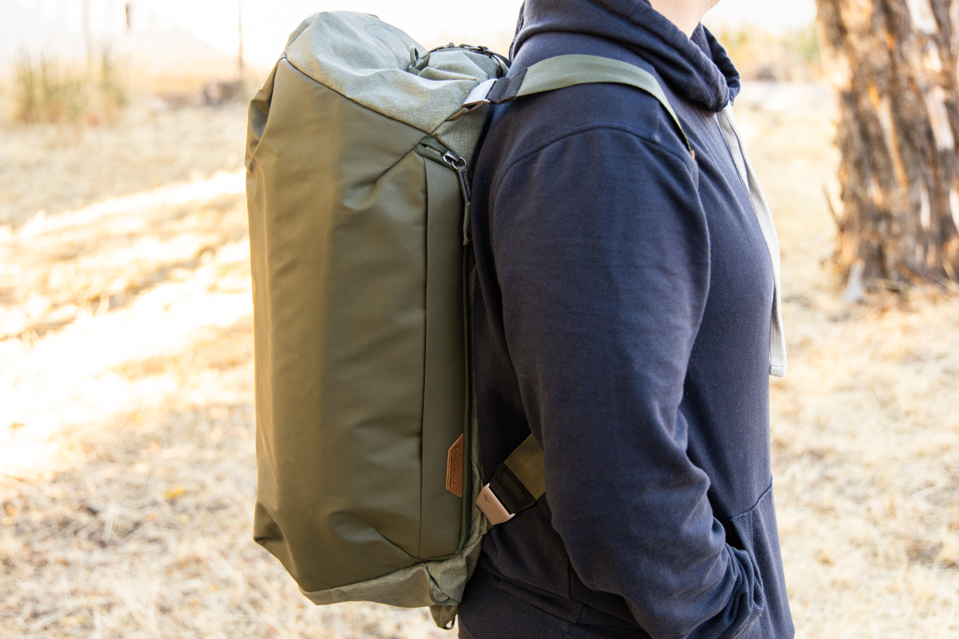 A man wears the Peak Design duffel as a backpack.