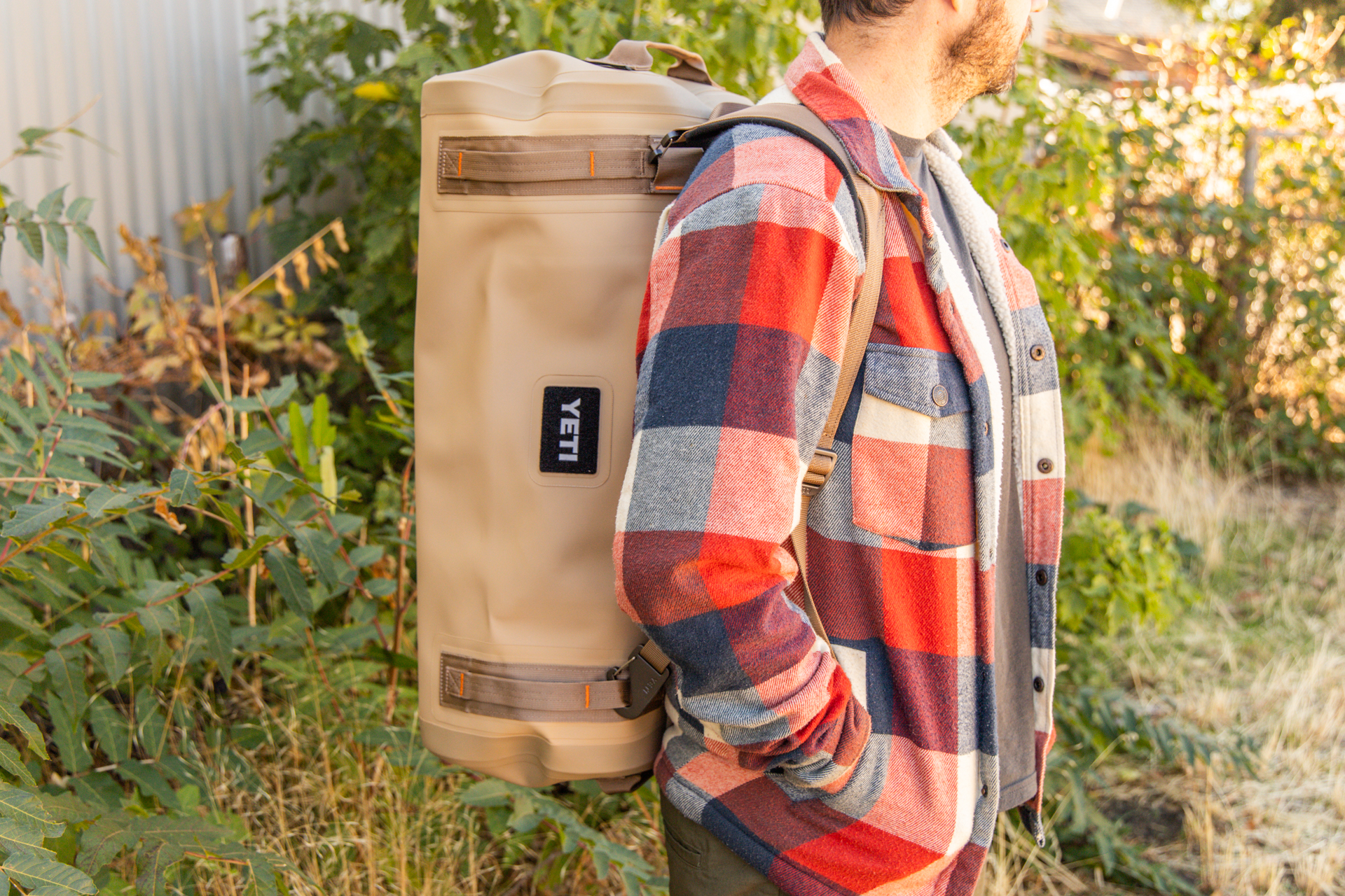 A man wears the Yeti Panga on his back as a backpack.